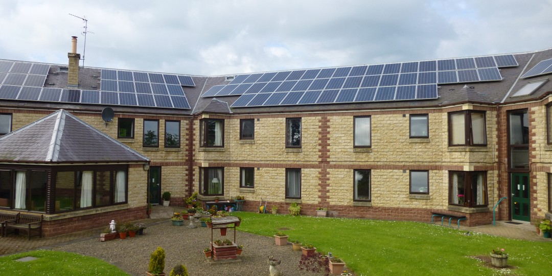 A roof-mounted solar PV system installed on a retirement home owned by Berwickshire Housing Association